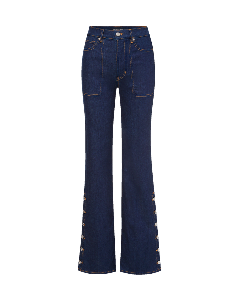Veronica Beard Dark blue flared jeans with side button details.