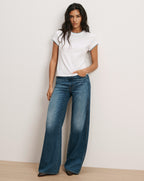Veronica Beard White t-shirt, blue jeans.