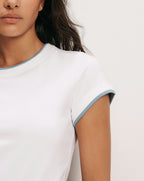 Veronica Beard White t-shirt with blue trim.