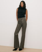 Veronica Beard Olive green coated flare jeans.