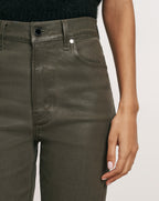 Veronica Beard Dark olive green coated high-waisted denim jeans.