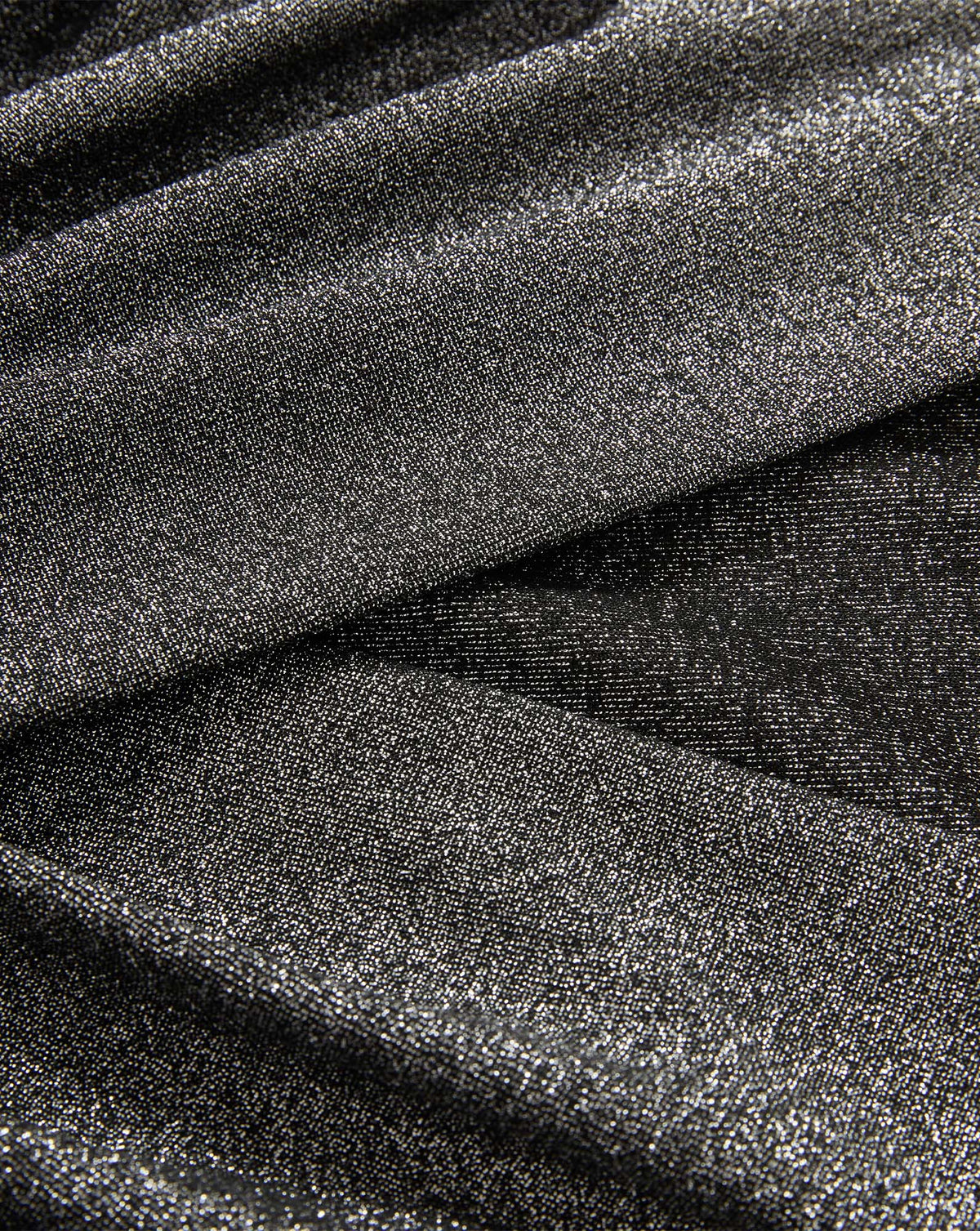 Veronica Beard Black metallic glitter fabric with draped texture.