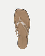Veronica Beard Beige square-toe flip-flop with clear PVC straps and black sole.