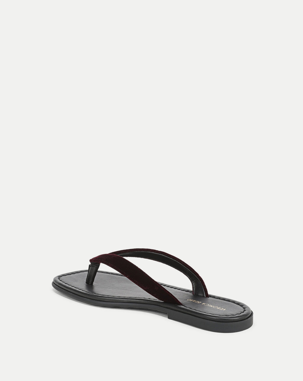 Veronica Beard Black leather sandal with a dark red velvet strap.