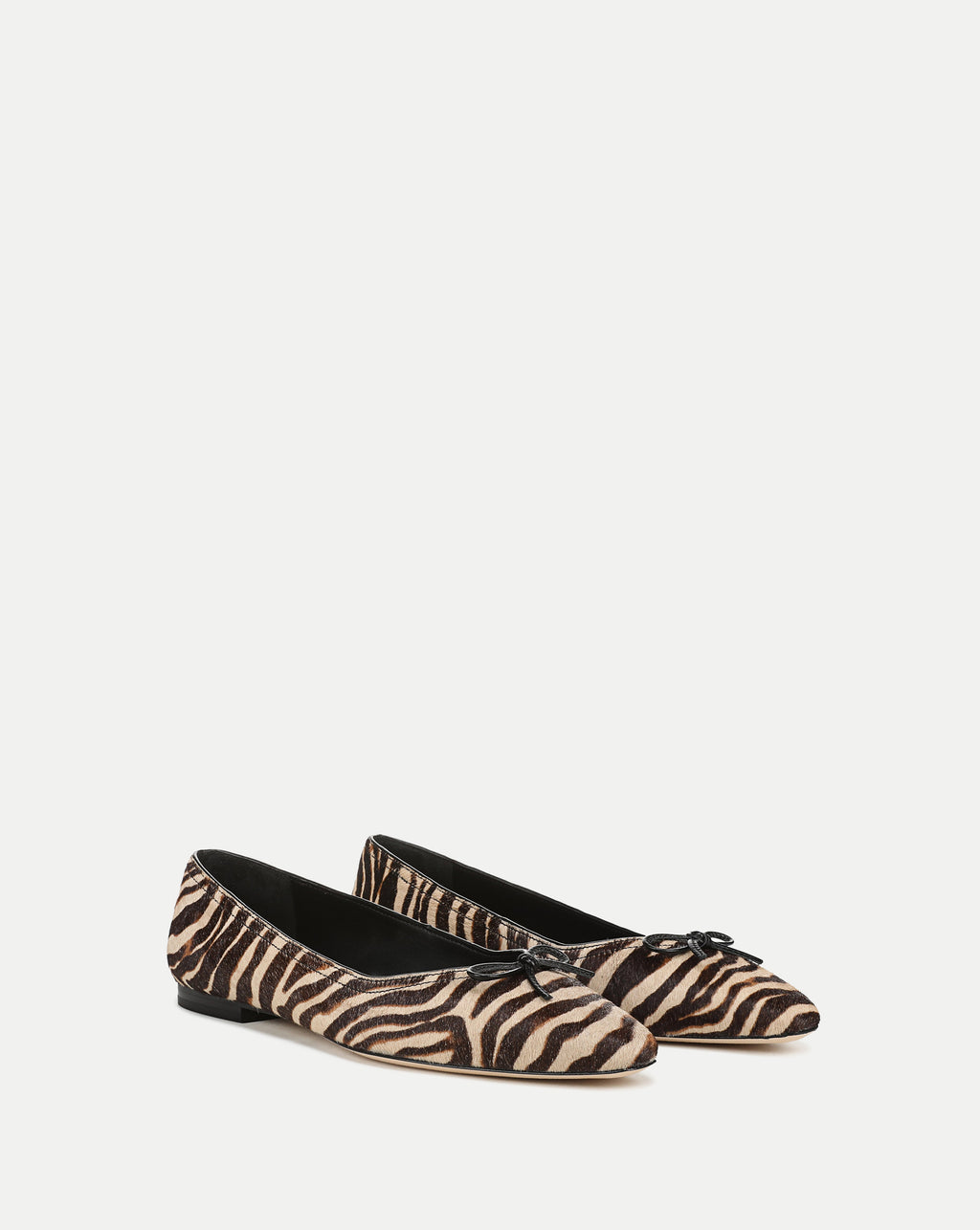 Veronica Beard Brown and beige zebra print bow ballet flats.