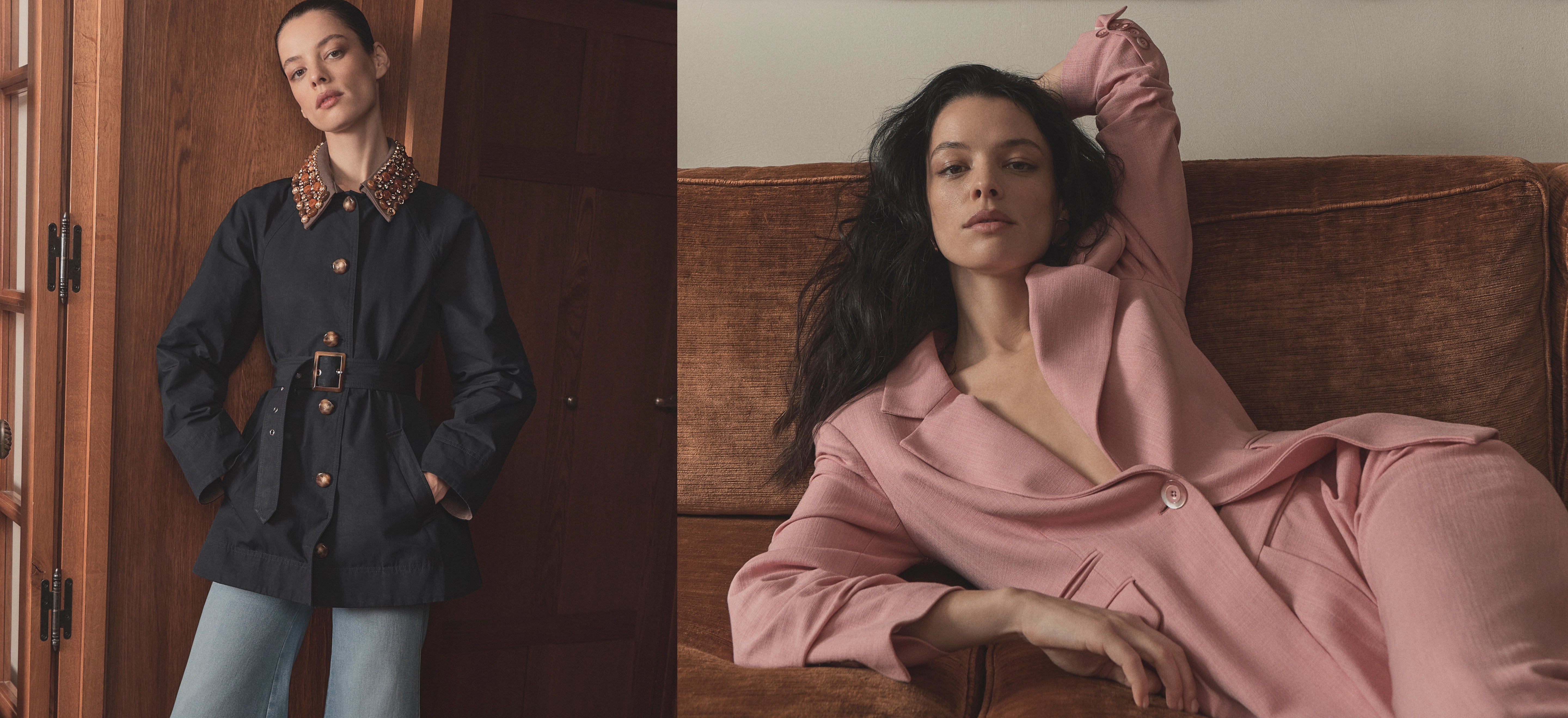 The image features two women in different outfits - one wearing a black coat with a patterned scarf, and the other wearing a pink robe-like garment, seated on a wicker chair against a wooden background.