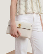 Veronica Beard White jeans, cream floral blouse.