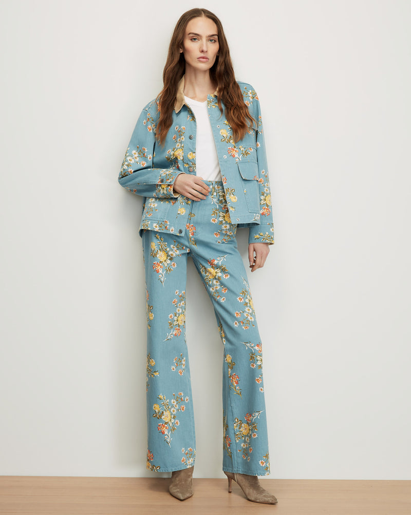 Veronica Beard Blue floral denim jacket and matching flared jeans.