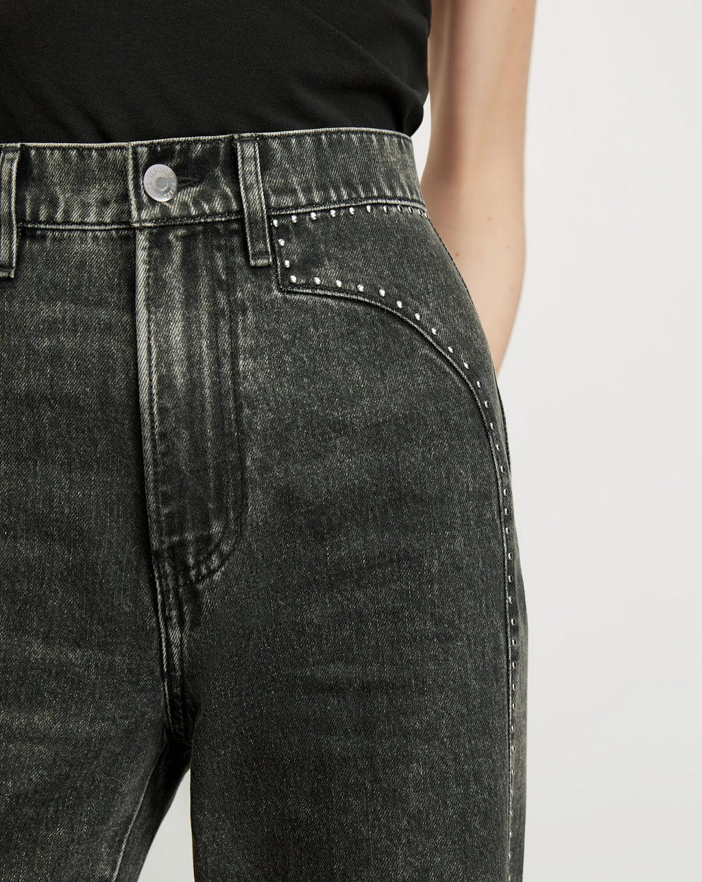 Veronica Beard Black acid wash jeans with silver studding.