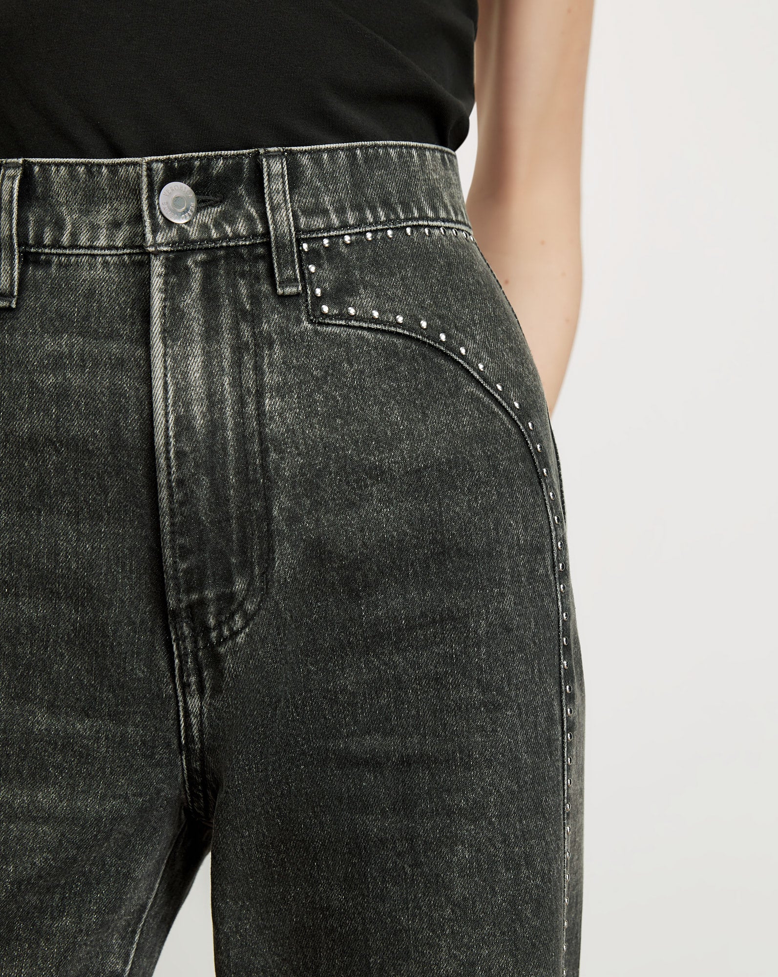 Veronica Beard Black acid wash jeans with silver studding.