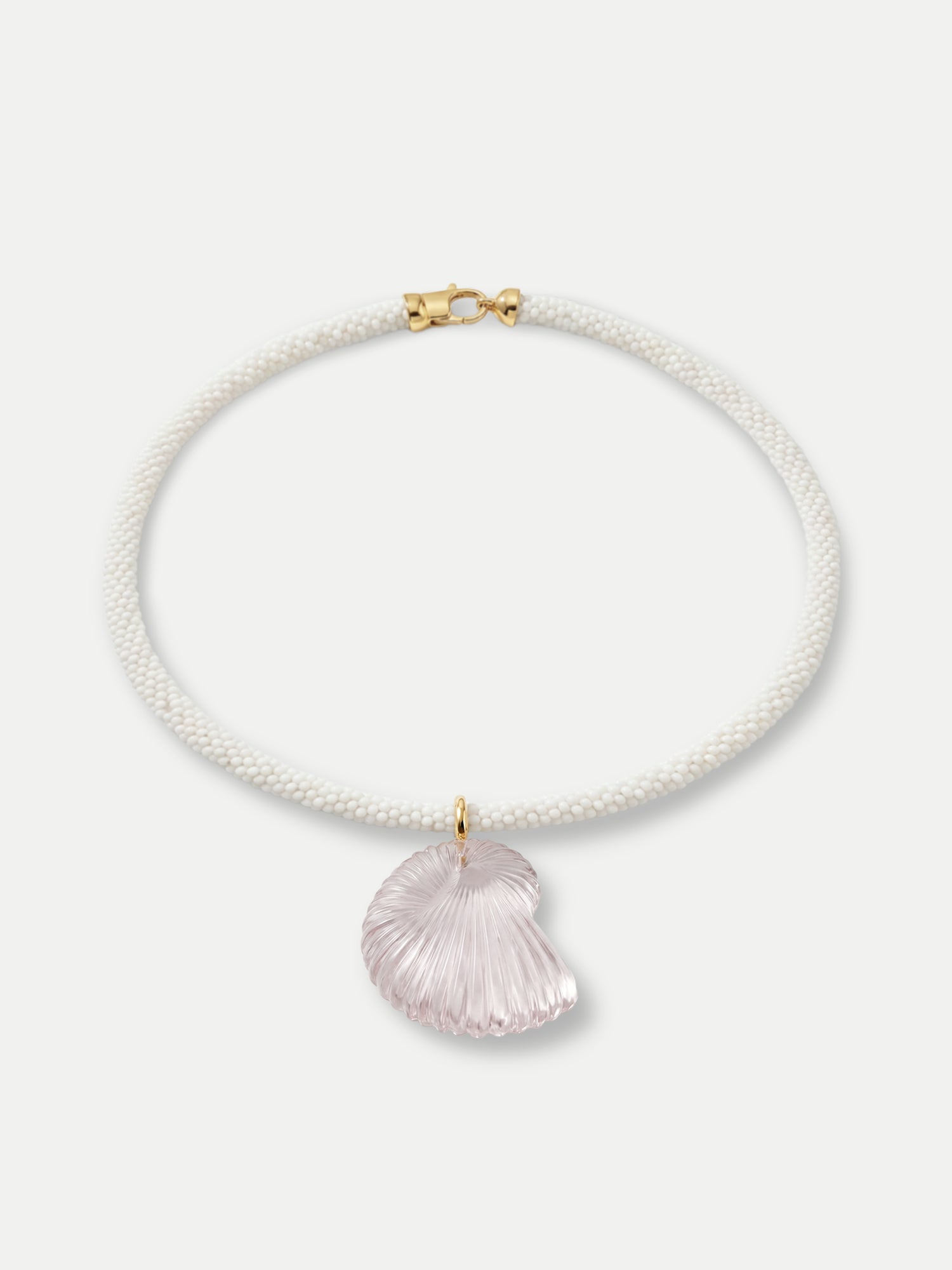 Veronica Beard White beaded necklace with a pink shell pendant.
