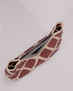 Veronica Beard Brown and tan crocheted raffia clutch with a dark brown triangular handle.