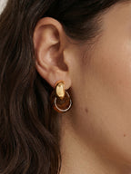 Veronica Beard Gold and brown resin double hoop earrings.