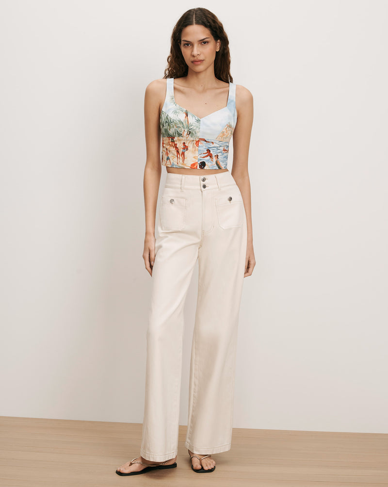 Veronica Beard Printed crop top and off-white wide-leg pants.