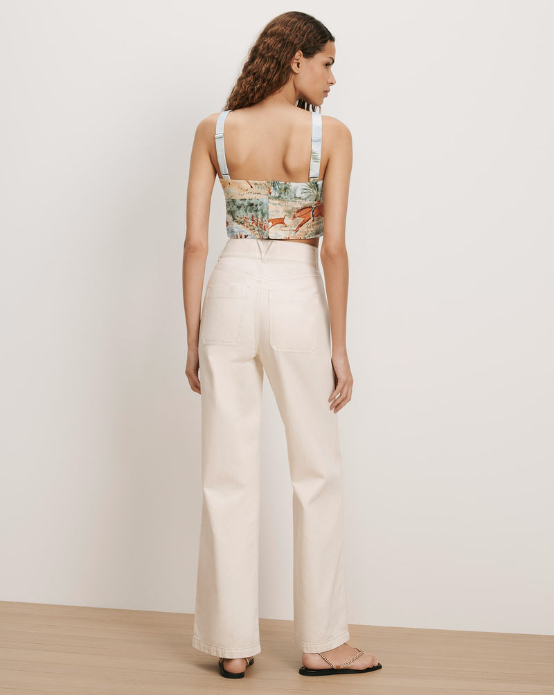 Veronica Beard Cream wide-leg jeans and a printed camisole.